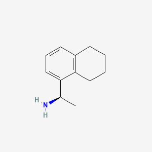 B579946 (1R)-1-(5,6,7,8-Tetrahydronaphthalen-1-yl)ethanamine CAS No. 851984-49-1
