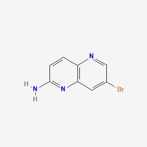 molecular formula C8H6BrN3 B580640 7-溴-1,5-萘啶-2-胺 CAS No. 1309774-04-6
