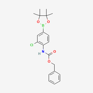 molecular formula C20H23BClNO4 B580729 Benzyl (2-chloro-4-(4,4,5,5-tetramethyl-1,3,2-dioxaborolan-2-yl)phenyl)carbamate CAS No. 1218791-42-4