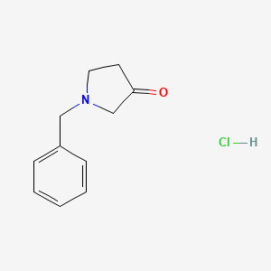 molecular formula C11H14ClNO B581189 1-Benzylpyrrolidin-3-one hydrochloride CAS No. 1012-01-7