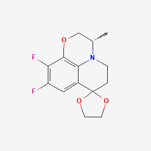 molecular formula C14H15F2NO3 B582850 (2'S)-6',7'-Difluoro-2'-methylspiro[1,3-dioxolane-2,10'-4-oxa-1-azatricyclo[7.3.1.05,13]trideca-5(13),6,8-triene] CAS No. 1798887-79-2