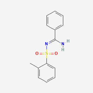 molecular formula C14H14N2O2S B5842496 N'-(2-methylphenyl)sulfonylbenzenecarboximidamide 