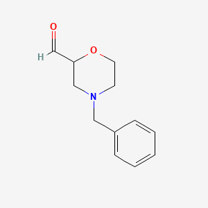 4-Benzylmorpholine-2-carbaldehyde