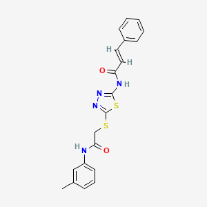 molecular formula C20H18N4O2S2 B5917739 N-(5-((2-oxo-2-(m-tolylamino)ethyl)thio)-1,3,4-thiadiazol-2-yl)cinnamamide 