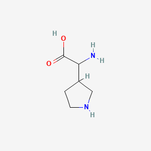 molecular formula C6H12N2O2 B594273 2-Amino-2-(pyrrolidin-3-yl)acetic acid CAS No. 1214812-00-6