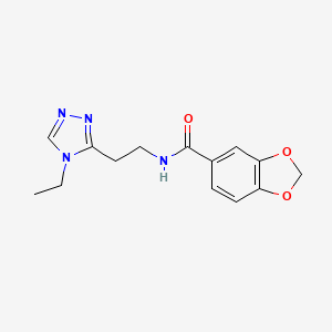 molecular formula C14H16N4O3 B5946006 N-[2-(4-ethyl-4H-1,2,4-triazol-3-yl)ethyl]-1,3-benzodioxole-5-carboxamide 