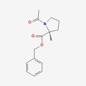 molecular formula C15H19NO3 B594851 benzyl (2S)-1-acetyl-2-methylpyrrolidine-2-carboxylate CAS No. 1268519-84-1