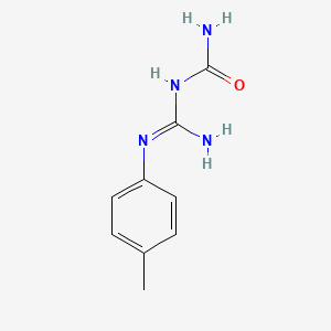 molecular formula C9H12N4O B5953757 N-{imino[(4-methylphenyl)amino]methyl}urea 