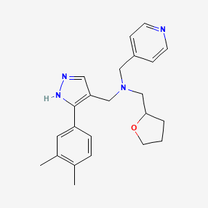 molecular formula C23H28N4O B5960791 N-[[5-(3,4-dimethylphenyl)-1H-pyrazol-4-yl]methyl]-1-(oxolan-2-yl)-N-(pyridin-4-ylmethyl)methanamine 