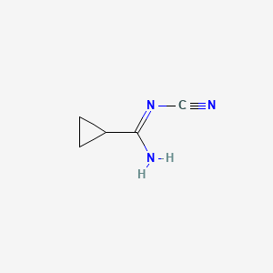 molecular formula C5H7N3 B596775 N'-cyanocyclopropanecarboximidamide CAS No. 1211577-53-5