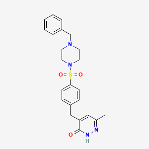 molecular formula C23H26N4O3S B5980231 4-{4-[(4-benzylpiperazin-1-yl)sulfonyl]benzyl}-6-methylpyridazin-3(2H)-one 
