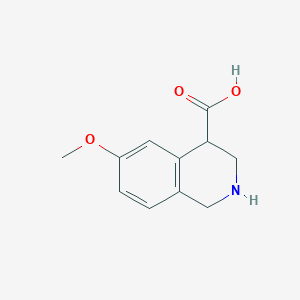 molecular formula C11H13NO3 B060301 6-Methoxy-1,2,3,4-tetrahydroisoquinoline-4-carboxylic acid CAS No. 1207175-96-9
