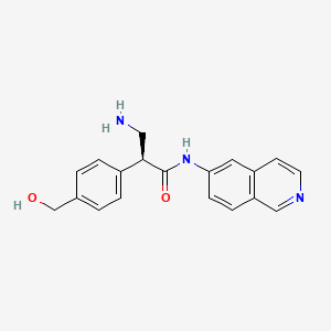 molecular formula C19H19N3O2 B605557 (2S)-3-amino-2-[4-(hydroxymethyl)phenyl]-N-isoquinolin-6-ylpropanamide CAS No. 1254032-16-0