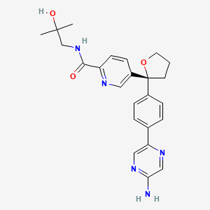 molecular formula C24H27N5O3 B605773 5-[(2R)-2-[4-(5-aminopyrazin-2-yl)phenyl]oxolan-2-yl]-N-(2-hydroxy-2-methylpropyl)pyridine-2-carboxamide CAS No. 1643809-54-4