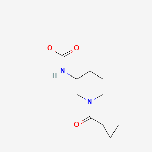 molecular formula C14H24N2O3 B6088144 Tert-butyl [1-(cyclopropylcarbonyl)piperidin-3-yl]carbamate 
