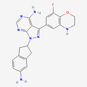 molecular formula C22H20FN7O B608953 1-(5-氨基-2,3-二氢-1H-茚-2-基)-3-(8-氟-3,4-二氢-2H-1,4-苯并恶嗪-6-基)吡唑并[3,4-d]嘧啶-4-胺 CAS No. 2058116-52-0