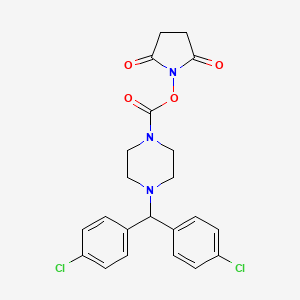 molecular formula C22H21Cl2N3O4 B609074 2,5-Dioxopyrrolidin-1-yl 4-(bis(4-chlorophenyl)methyl)piperazine-1-carboxylate CAS No. 1438416-21-7