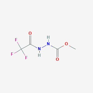 molecular formula C4H5F3N2O3 B060928 Methyl N-[(2,2,2-trifluoroacetyl)amino]carbamate CAS No. 180895-43-6