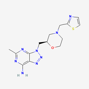molecular formula C14H18N8OS B609932 5-methyl-3-[[(2R)-4-(1,3-thiazol-2-ylmethyl)morpholin-2-yl]methyl]triazolo[4,5-d]pyrimidin-7-amine CAS No. 1305116-69-1