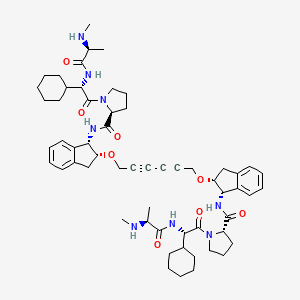 B612067 (2S)-1-[(2S)-2-cyclohexyl-2-[[(2S)-2-(methylamino)propanoyl]amino]acetyl]-N-[(1S,2R)-2-[6-[[(1S,2R)-1-[[(2S)-1-[(2S)-2-cyclohexyl-2-[[(2S)-2-(methylamino)propanoyl]amino]acetyl]pyrrolidine-2-carbonyl]amino]-2,3-dihydro-1H-inden-2-yl]oxy]hexa-2,4-diynoxy]-2,3-dihydro-1H-inden-1-yl]pyrrolidine-2-carboxamide CAS No. 1258392-53-8