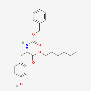 hexyl (2S)-3-(4-hydroxyphenyl)-2-(phenylmethoxycarbonylamino)propanoate