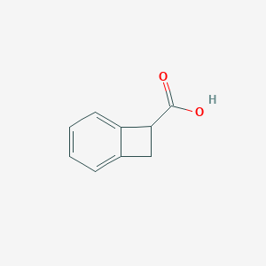 molecular formula C9H8O2 B061640 Bicyclo[4.2.0]octa-1,3,5-triene-7-carboxylic acid CAS No. 163222-89-7