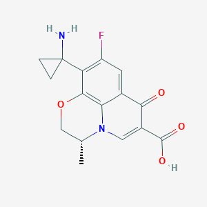 molecular formula C16H15FN2O4 B062920 (2R)-6-(1-Aminocyclopropyl)-7-fluoro-2-methyl-10-oxo-4-oxa-1-azatricyclo[7.3.1.05,13]trideca-5(13),6,8,11-tetraene-11-carboxylic acid CAS No. 166665-94-7