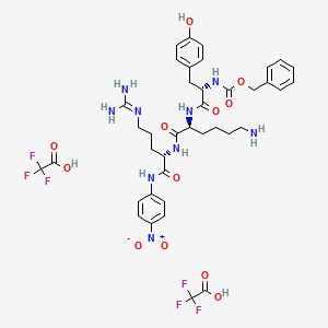 molecular formula C39H47F6N9O12 B6303602 benzyl N-[(2S)-1-[[(2S)-6-amino-1-[[(2S)-5-(diaminomethylideneamino)-1-(4-nitroanilino)-1-oxopentan-2-yl]amino]-1-oxohexan-2-yl]amino]-3-(4-hydroxyphenyl)-1-oxopropan-2-yl]carbamate;2,2,2-trifluoroacetic acid CAS No. 385437-11-6