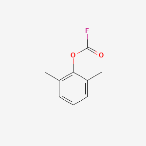 B6317748 2,6-Dimethylphenylfluoroformate CAS No. 153880-74-1