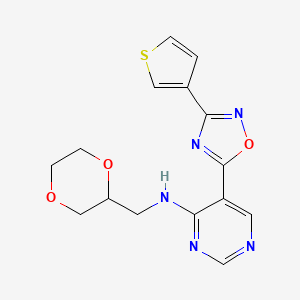 N-[(1,4-dioxan-2-yl)methyl]-5-[3-(thiophen-3-yl)-1,2,4-oxadiazol-5-yl]pyrimidin-4-amine