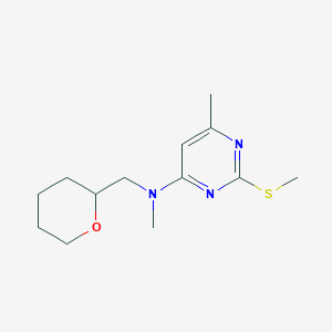 N,6-dimethyl-2-(methylsulfanyl)-N-[(oxan-2-yl)methyl]pyrimidin-4-amine