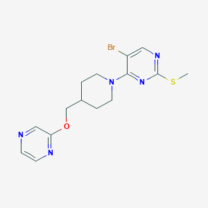 B6438618 5-bromo-2-(methylsulfanyl)-4-{4-[(pyrazin-2-yloxy)methyl]piperidin-1-yl}pyrimidine CAS No. 2549056-84-8