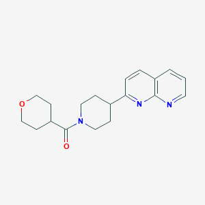 2-[1-(oxane-4-carbonyl)piperidin-4-yl]-1,8-naphthyridine