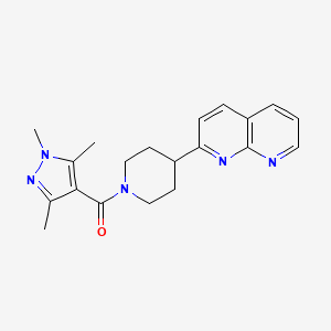 molecular formula C20H23N5O B6465851 2-[1-(1,3,5-trimethyl-1H-pyrazole-4-carbonyl)piperidin-4-yl]-1,8-naphthyridine CAS No. 2640896-08-6