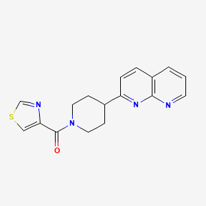 molecular formula C17H16N4OS B6465930 2-[1-(1,3-thiazole-4-carbonyl)piperidin-4-yl]-1,8-naphthyridine CAS No. 2640898-33-3