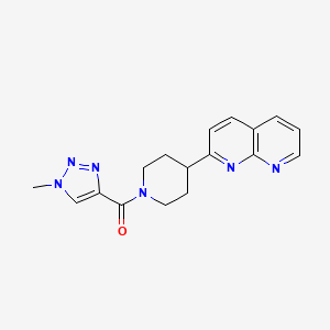 molecular formula C17H18N6O B6466008 2-[1-(1-methyl-1H-1,2,3-triazole-4-carbonyl)piperidin-4-yl]-1,8-naphthyridine CAS No. 2640951-19-3