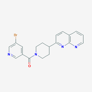 molecular formula C19H17BrN4O B6466425 2-[1-(5-bromopyridine-3-carbonyl)piperidin-4-yl]-1,8-naphthyridine CAS No. 2640822-68-8