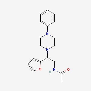 molecular formula C18H23N3O2 B6487713 N-[2-(furan-2-yl)-2-(4-phenylpiperazin-1-yl)ethyl]acetamide CAS No. 877631-84-0