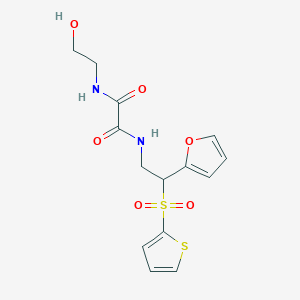 molecular formula C14H16N2O6S2 B6521085 N'-[2-(furan-2-yl)-2-(thiophene-2-sulfonyl)ethyl]-N-(2-hydroxyethyl)ethanediamide CAS No. 896316-54-4