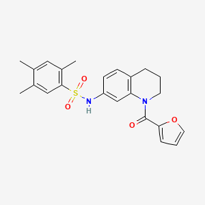N-[1-(furan-2-carbonyl)-1,2,3,4-tetrahydroquinolin-7-yl]-2,4,5-trimethylbenzene-1-sulfonamide