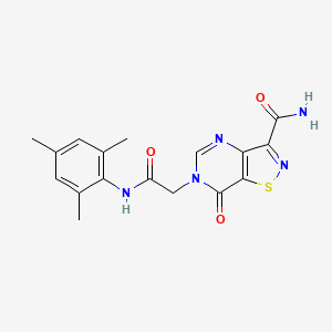 B6585368 7-oxo-6-{[(2,4,6-trimethylphenyl)carbamoyl]methyl}-6H,7H-[1,2]thiazolo[4,5-d]pyrimidine-3-carboxamide CAS No. 1251606-47-9