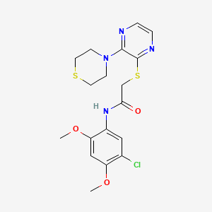 B6586778 N-(5-chloro-2,4-dimethoxyphenyl)-2-{[3-(thiomorpholin-4-yl)pyrazin-2-yl]sulfanyl}acetamide CAS No. 1030116-80-3