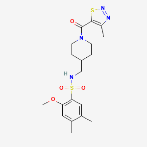 B6587786 2-methoxy-4,5-dimethyl-N-{[1-(4-methyl-1,2,3-thiadiazole-5-carbonyl)piperidin-4-yl]methyl}benzene-1-sulfonamide CAS No. 1234851-17-2