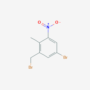 B6601806 5-bromo-1-(bromomethyl)-2-methyl-3-nitrobenzene CAS No. 1807196-13-9