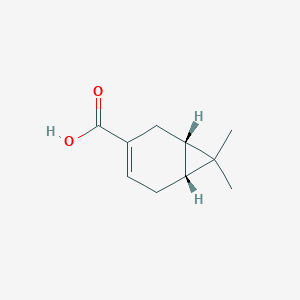 B6619595 (1S,6R)-7,7-dimethylbicyclo[4.1.0]hept-3-ene-3-carboxylic acid CAS No. 498-12-4
