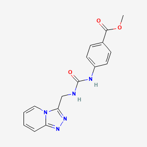 molecular formula C16H15N5O3 B6622213 Methyl 4-{[({[1,2,4]triazolo[4,3-a]pyridin-3-yl}methyl)carbamoyl]amino}benzoate 