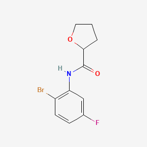 molecular formula C11H11BrFNO2 B6629254 N-(2-bromo-5-fluorophenyl)oxolane-2-carboxamide 