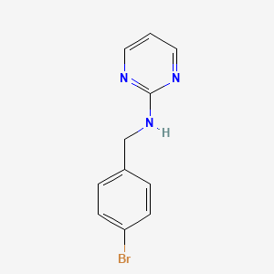 molecular formula C11H10BrN3 B6632512 N-[(4-bromophenyl)methyl]pyrimidin-2-amine 