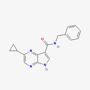 molecular formula C17H16N4O B6650380 N-Benzyl-2-cyclopropyl-5H-pyrrolo[2,3-b]pyrazine-7-carboxamide 