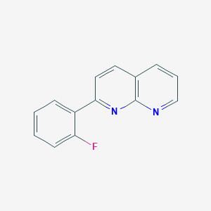 molecular formula C14H9FN2 B066768 2-(2-Fluorophenyl)-1,8-naphthyridine CAS No. 170439-25-5